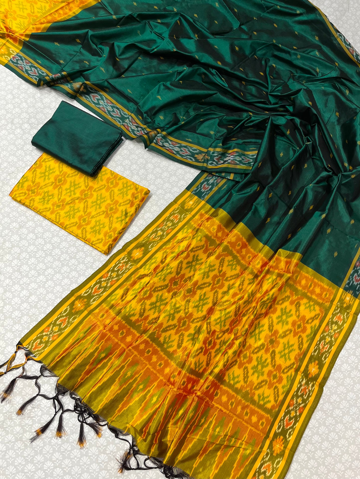 YELLOW COLOUR IKAT PURE SILK UNSTITCHED SUIT WITH CONTRAST GREEN DUPATTA (DRESS MATERIAL)