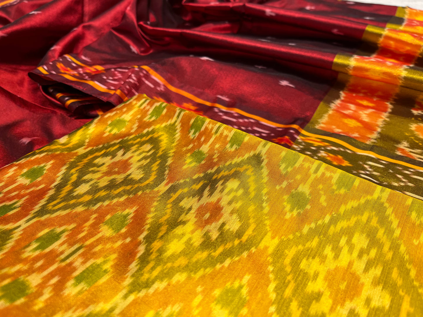 YELLOW COLOUR IKAT PURE SILK UNSTITCHED SUIT WITH CONTRAST RED DUPATTA