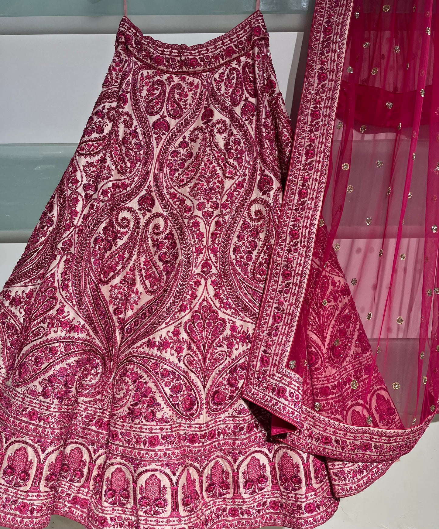 BRIDAL PINK COLOUR SILK HAND EMBROIDERED LEHENGA WITH NET DUPATTA EMBELLISHED WITH ZARDOZI WORK & UNSTITCHED BLOUSE
