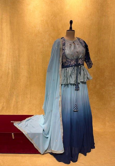AQUA COLOUR GEORGETTE LEHENGA WITH PEPLUM STYLE BLOUSE EMBELLISHED WITH SILVER ZARI EMBROIDERY