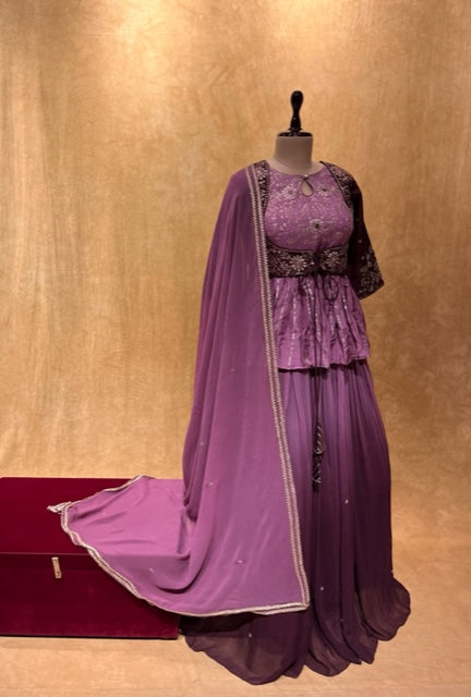 LAVENDER COLOUR SHADED GEORGETTE LEHENGA WITH PEPLUM STYLE TOP EMBELLISHED WITH ZARI THREAD WORK