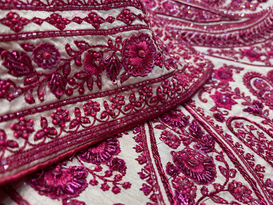 BRIDAL PINK COLOUR SILK HAND EMBROIDERED LEHENGA WITH NET DUPATTA EMBELLISHED WITH ZARDOZI WORK & UNSTITCHED BLOUSE