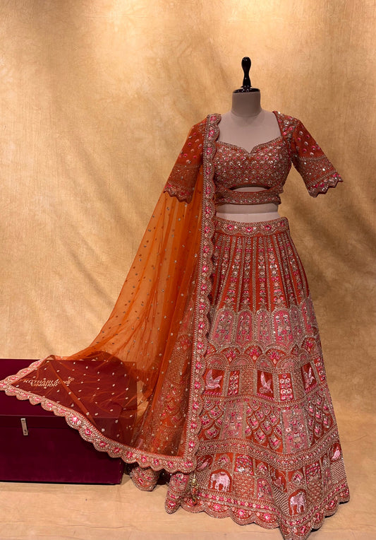 ( DELIVERY IN 25 DAYS ) RUST ORANGE COLOUR SILK HAND EMBROIDERED LEHENGA EMBELLISHED WITH CUTDANA, SEQUINS & RESHAM EMBROIDERY WORK