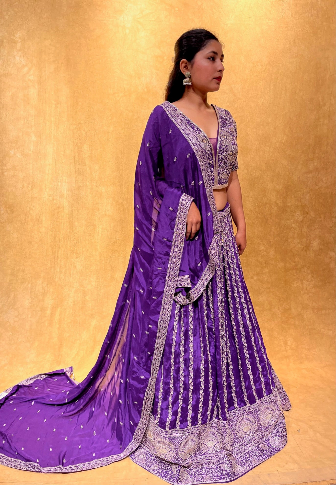 (DELIVERY IN 20-25 DAYS) PURPLE COLOUR CHINON HAND EMBROIDERED LEHENGA EMBELLISHED WITH ZARI & CUTDANA WORK
