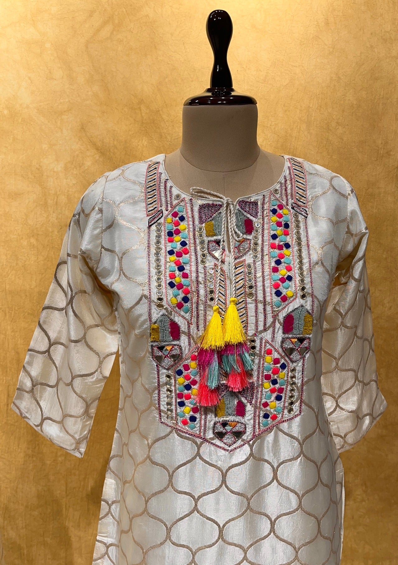 WHITE COLOUR CREPE SILK KURTA WITH DHOTI STYLE PANT EMBELLISHED WITH MIRROR FOIL WORK