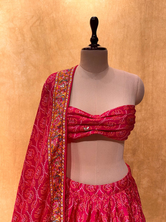 (DELIVERY IN 30 DAYS) BRIDESMAIDS READYMADE HOT PINK COLOUR BANDHANI PRINT LEHENGA EMBELLISHED WITH CUTDANA WORK