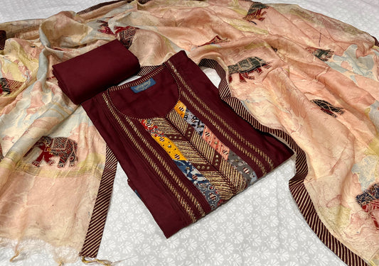 (DELIVERY IN 30 DAYS) MAROON COLOUR CHANDERI UNSTITCHED SUIT & PATCH WORK DUPATTA EMBELLISHED WITH CUTDANA WORK
