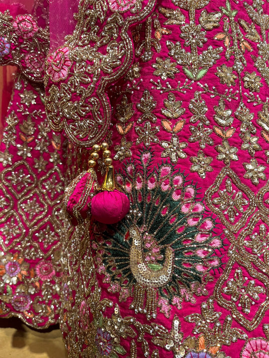 RANI PINK COLOUR SILK HAND EMBROIDERED BRIDAL LEHENGA EMBELLISHED WITH CUTDANA & SEQUINS WORK