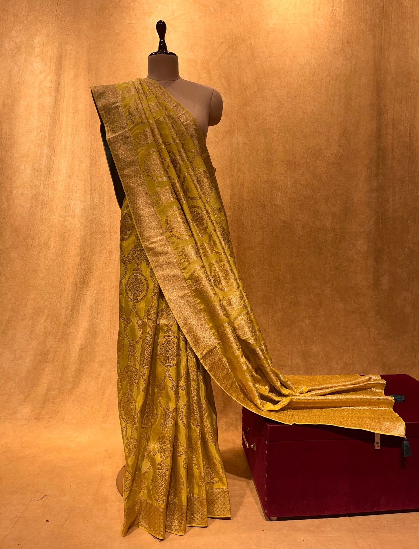 PARROT GREEN COLOUR GEORGETTE TISSUE SAREE EMBELLISHED WITH ZARI WEAVES