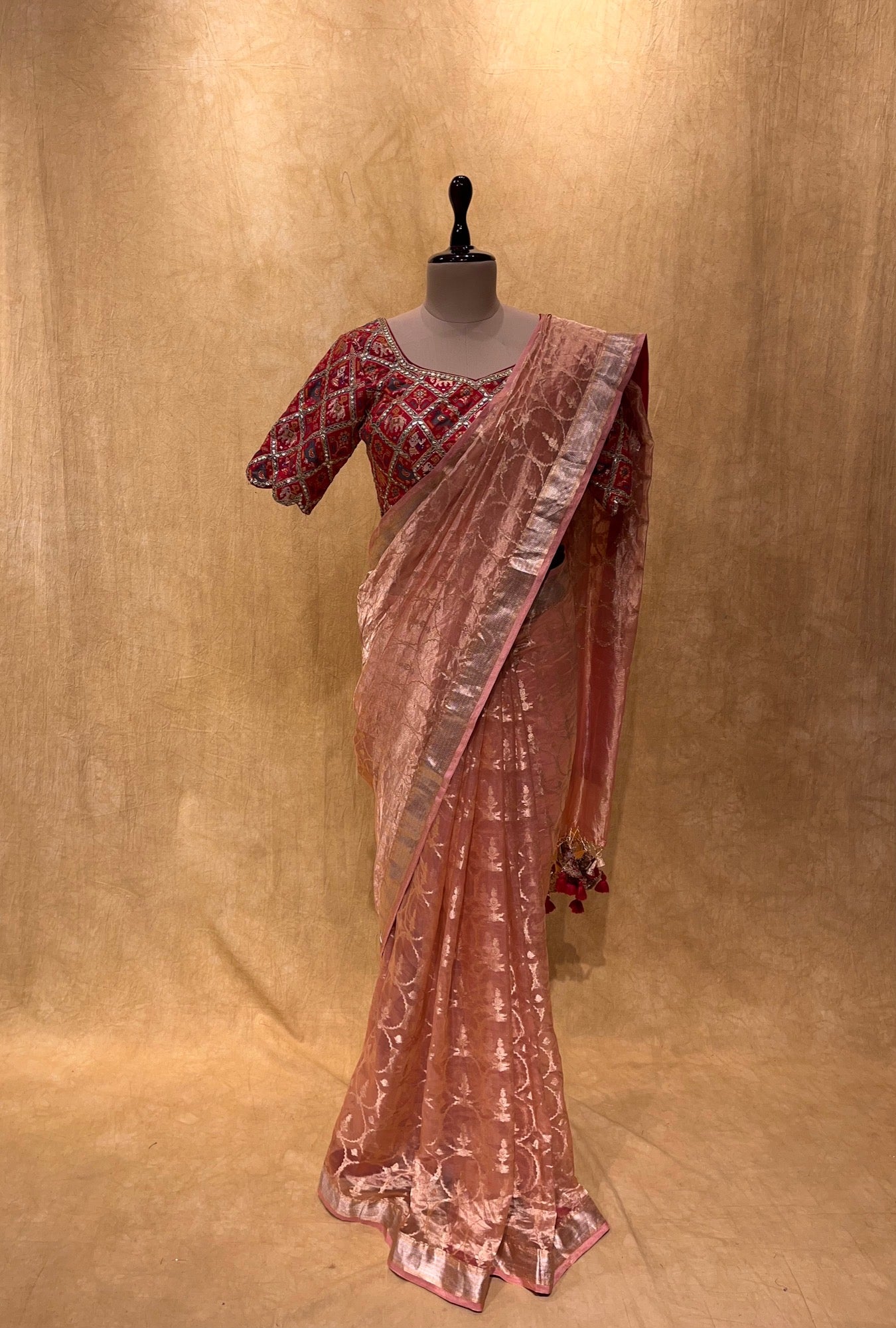 (DELIVERY IN 30 DAYS) PEACH COLOUR ORGANZA BANARASI SAREE WITH READYMADE PATOLA PRINT BLOUSE EMBELLISHED WITH GOTA PATTI WORK