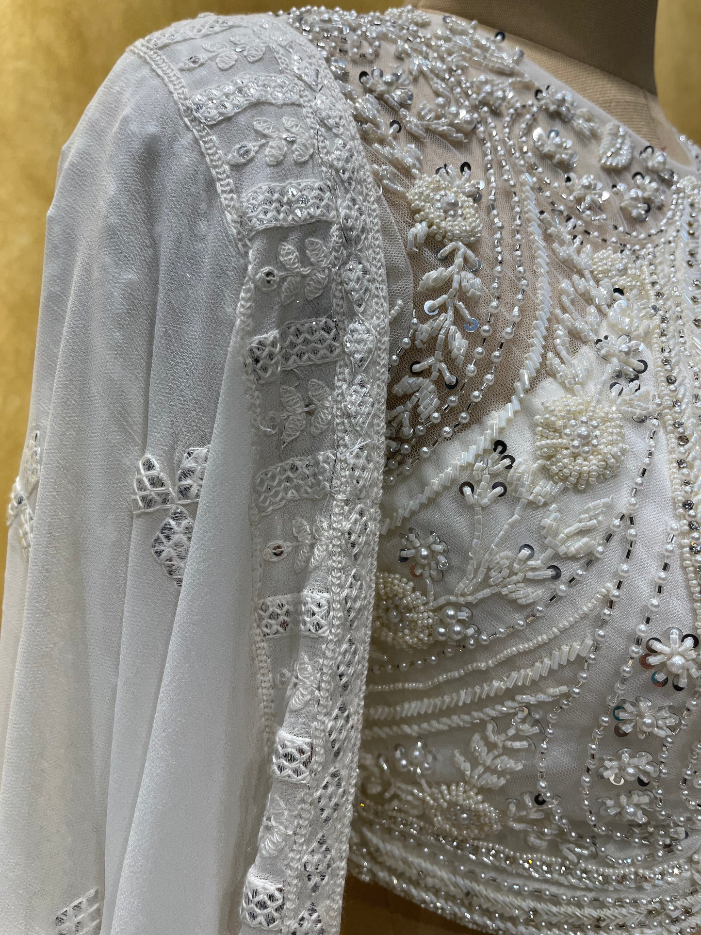 (DELIVERY IN 25 DAYS) BRIDESMAIDS READYMADE WHITE COLOUR ORGANZA LEHENGA WITH HAND EMBROIDERED BLOUSE  & GEORGETTE DUPATTA EMBELLISHED WITH  PEARL, CUTDANA & MIRROR FOIL WORK