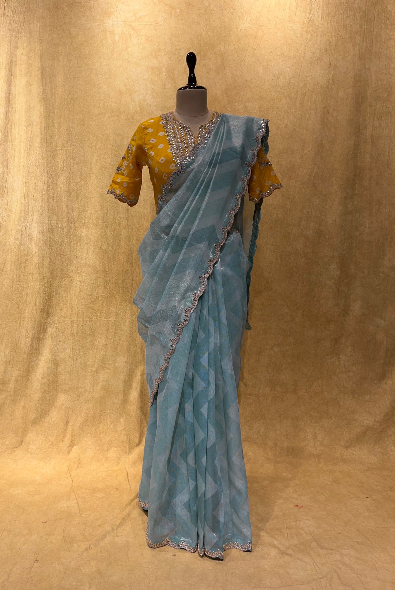 (DELIVERY IN 30 DAYS) AQUA COLOUR TISSUE SILK SAREE WITH READYMADE BLOUSE EMBELLISHED WITH GOTA PATTI WORK