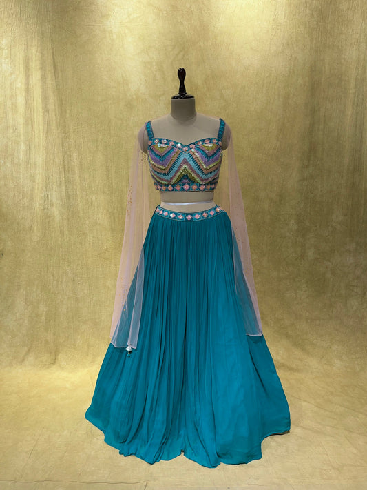 (DELIVERY IN 20-25 DAYS) TURQUOISE BLUE GEORGETTE LEHENGA WITH DESIGNER BLOUSE EMBELLISHED WITH CUTDANA WORK