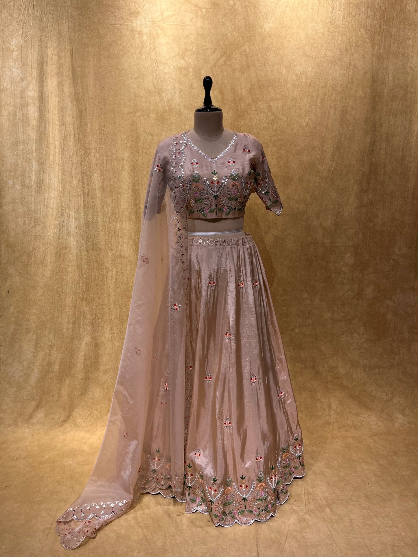 (DELIVERY IN 20-25 DAYS) PEACH  COLOUR MUSLIN SILK LEHENGA EMBELLISHED WITH GOTA PATTI, PEARL & RESHAM WORK