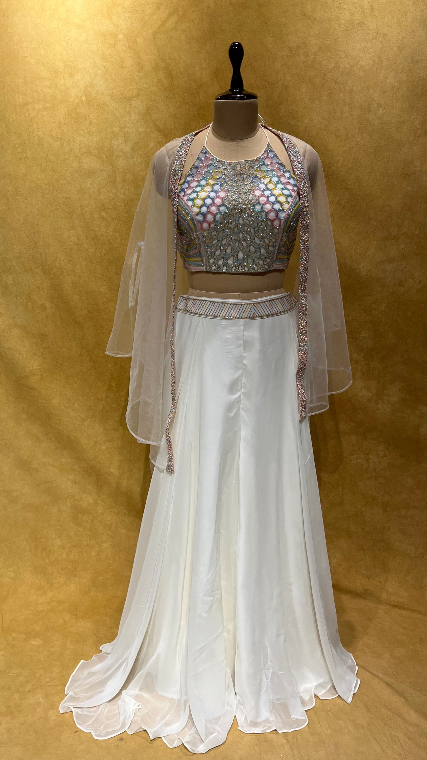 WHITE COLOUR ORGANZA PALAZZO WITH HAND EMBROIDERED CROP TOP BLOUSE & NET SHRUG EMBELLISHED WITH CUTDANA WORK
