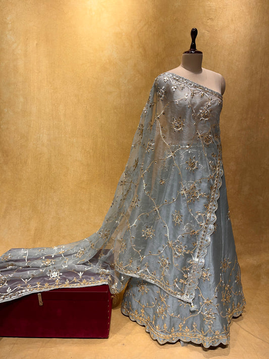 BRIDESMAIDS GREY COLOUR ORGANZA LEHENGA WITH UNSTITCHED BLOUSE EMBELLISHED WITH GOTA PATTI WORK