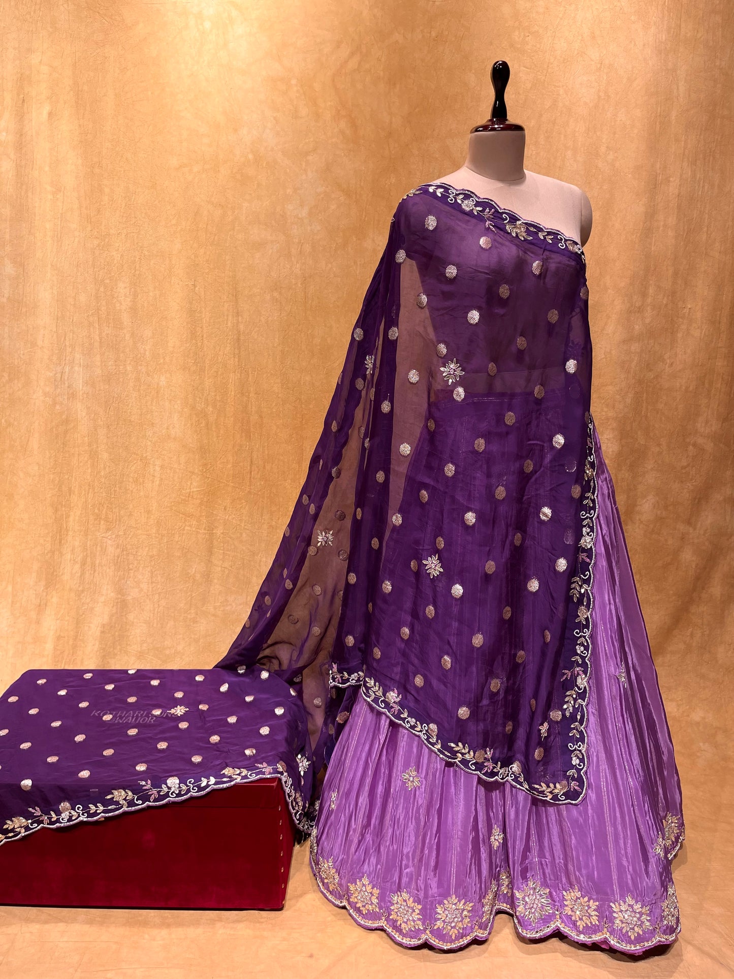 (DELIVERY IN 25 DAYS) PURPLE COLOUR CREPE SILK LEHENGA WITH ORGANZA DUPATTA EMBELLISHED WITH GOTA PATTI, CUTDANA WORK