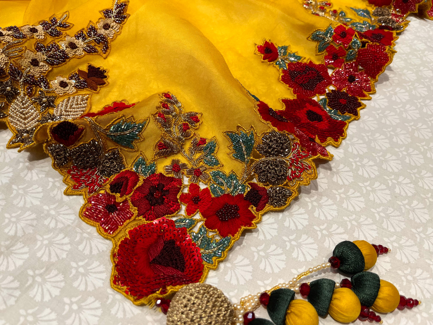 ( DELIVERY IN 25 DAYS ) MUSTARD COLOUR PURE ORGANZA HAND EMBROIDERED SAREE EMBELLISHED WITH SEQUINS, CUTDANA & ZARDOSI WORK