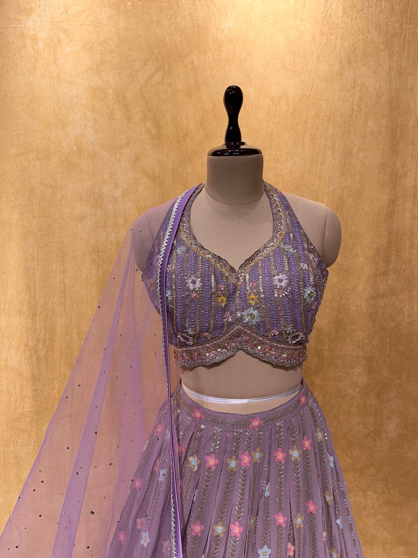 (DELIVERY IN 20-25 DAYS) PURPLE SHADED GEORGETTE LEHENGA WITH DESIGNER BLOUSE EMBELLISHED WITH SEQUINS & RESHAM WORK