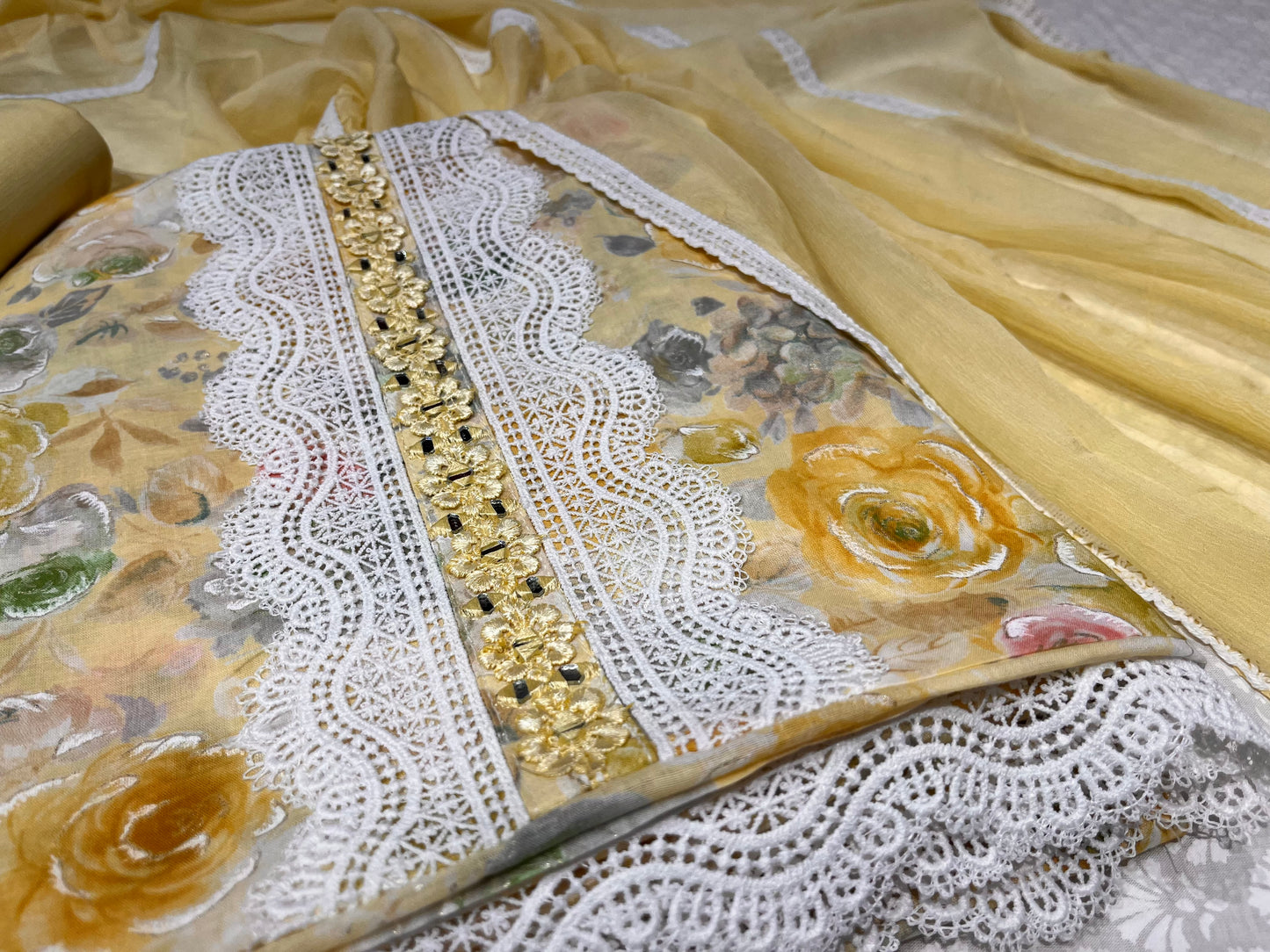 YELLOW COLOUR COTTON UNSTITCHED PRINTED SUIT WITH CHIFFON LACE DUPATTA