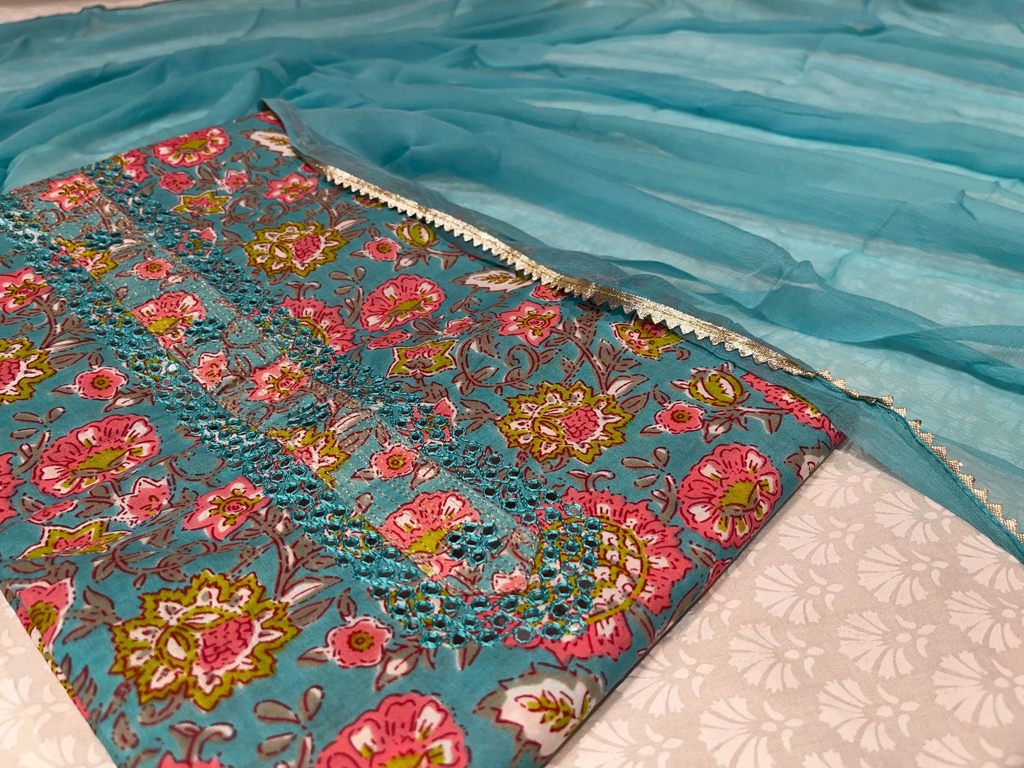 (DELIVERY IN 25-30 DAYS) SKY BLUE COTTON PRINTED SUIT WITH CHIFFON DUPATTA EMBELLISHED WITH MIRROR WORK