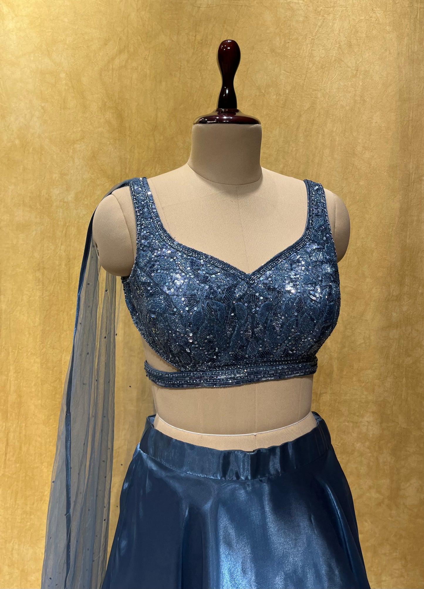 (DELIVERY IN 25 DAYS ) BLUE COLOUR IMPORTED GLASS TISSUE FABRIC SKIRT WITH HAND EMBROIDERED CROP TOP BLOUSE EMBELLISHED WITH CUTDANA & SEQUINS WORK