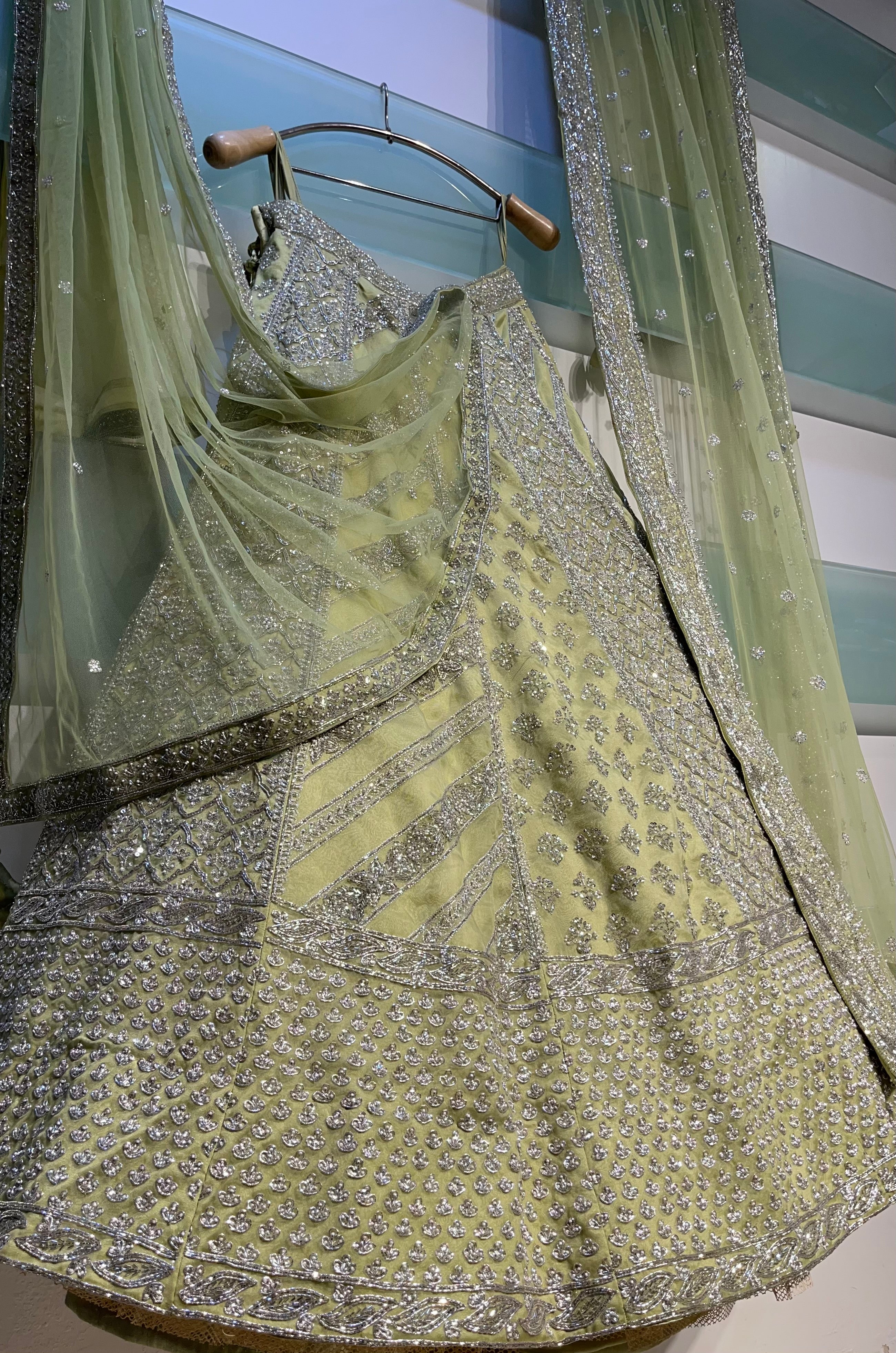 PISTA GREEN COLOUR PURE ORGANZA HAND EMBROIDERED LEHENGA EMBELLISHED WITH CUTDANA WORK