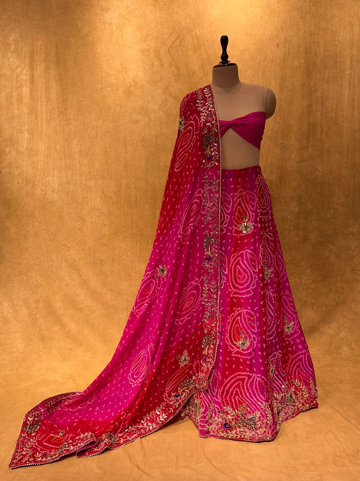 (DELIVERY IN 20-25 DAYS) SHADED BANDHEJ LEHENGA EMBELLISHED WITH CUTDANA AND GOTA PATTI WORK