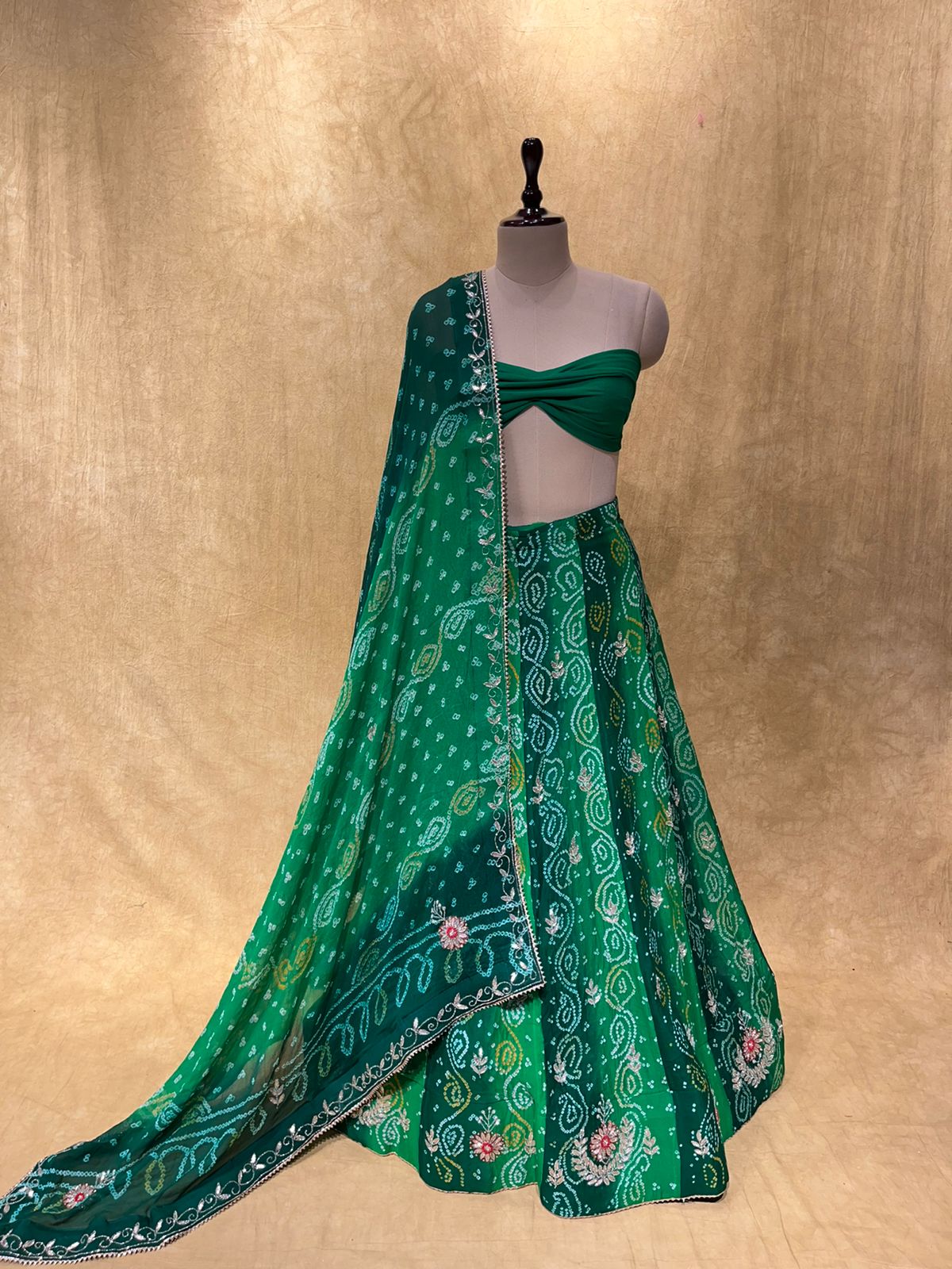 (DELIVERY IN 30 DAYS) SHADED BANDHEJ LEHENGA EMBELLISHED WITH GOTA PATTI AND CUTDANA WORK