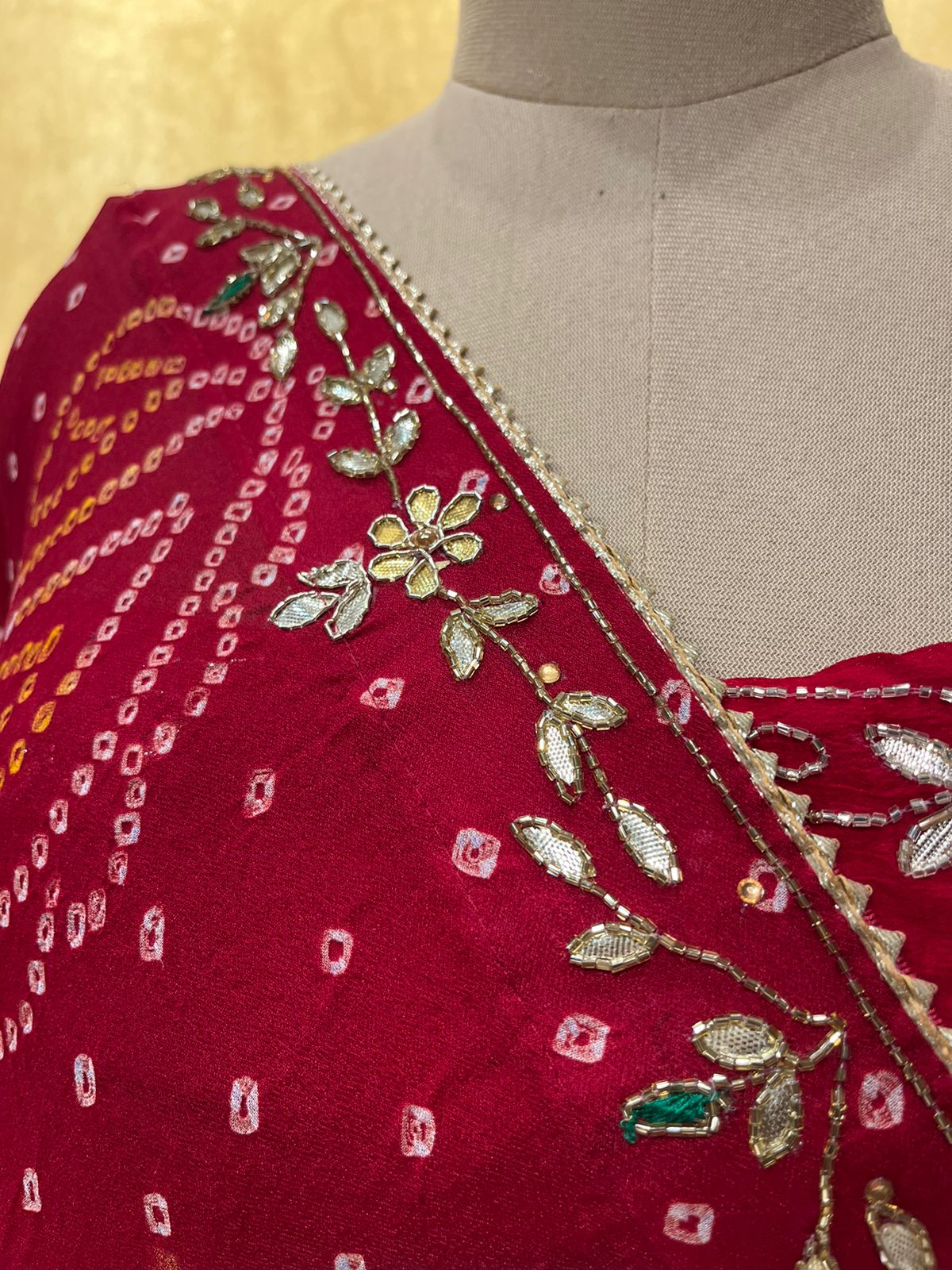 (DELIVERY IN 30 DAYS) MAROON BANDHEJ PURE GEORGETTE OJARIYA LEHENGA EMBELLISHED WITH CUTDANA AND GOTA PATTI WORK