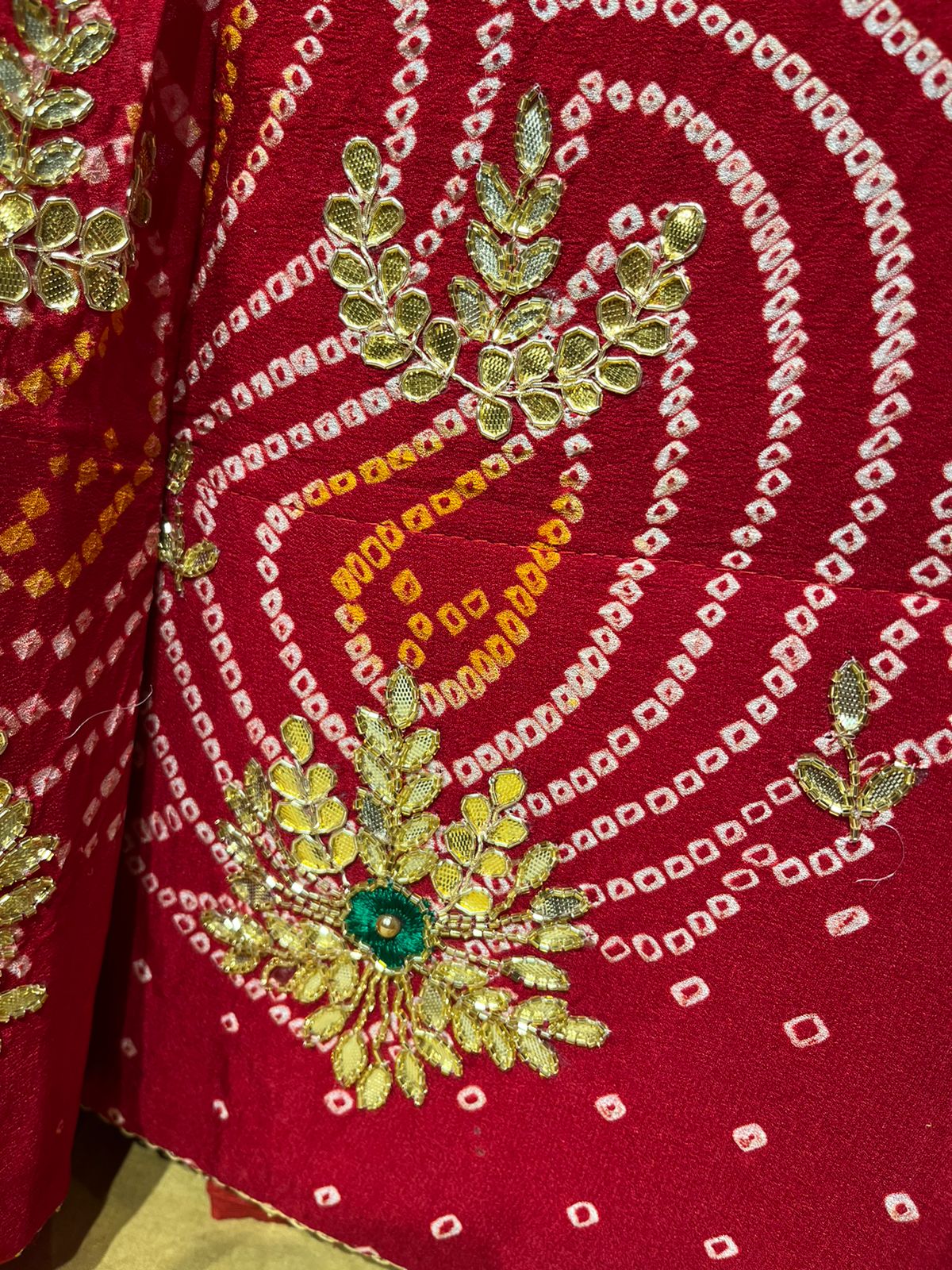 (DELIVERY IN 30 DAYS) MAROON BANDHEJ PURE GEORGETTE OJARIYA LEHENGA EMBELLISHED WITH CUTDANA AND GOTA PATTI WORK