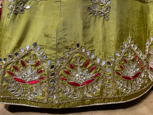 (DELIVERY IN 30 DAYS) OLIVE GREEN COLOUR SILK LEHENGA WITH CONTRAST RED GHARCHOLA DUPATTA